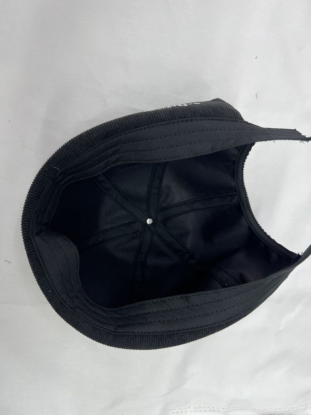 Black cap on a white background